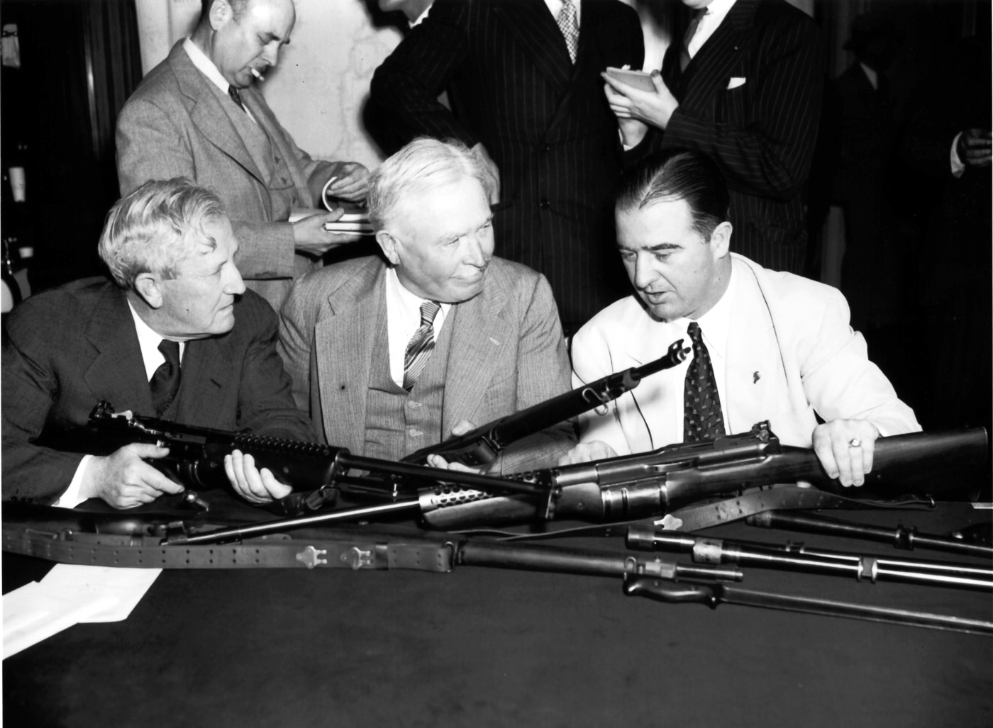 Johnson rifle reviewed by Senatorial types 1940
