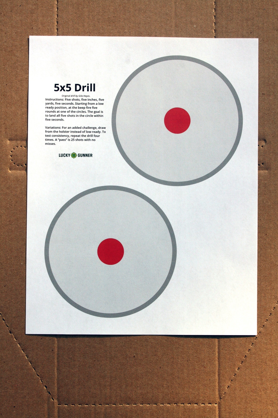 A shooting target features a single 5-inch diameter circle printed on paper for timed marksmanship assessment. Five-second drills test shooting speed. Circle target practice evaluates accuracy. Timed pistol exercises measure proficiency. Rapid-fire challenges assess equipment suitability. Draw stroke integration increases difficulty.