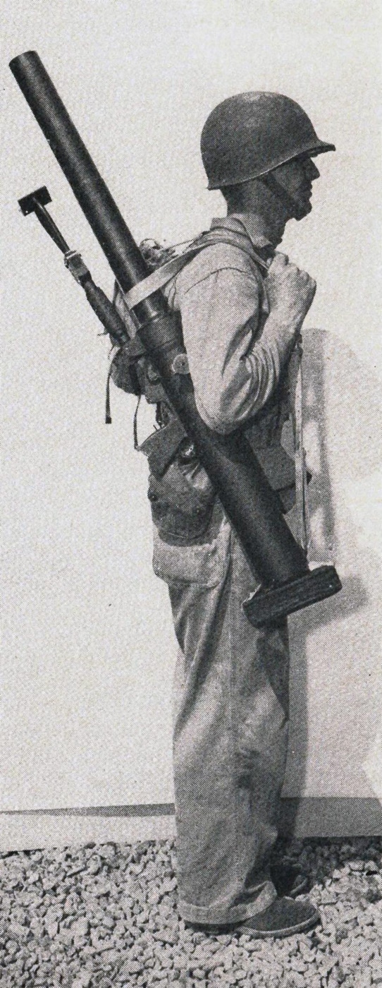 Marine carrying a Garrett shoulder fired mortar