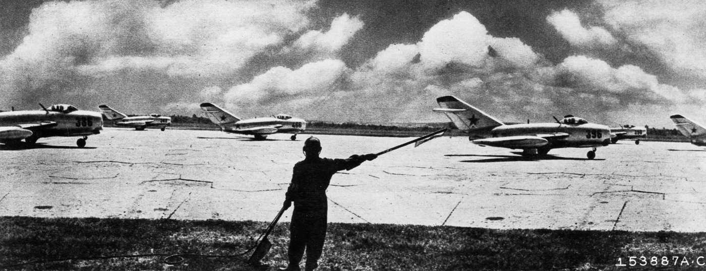 Soviet built MiG-15 fighters ready for take-off from a North Korea air base during Korean War