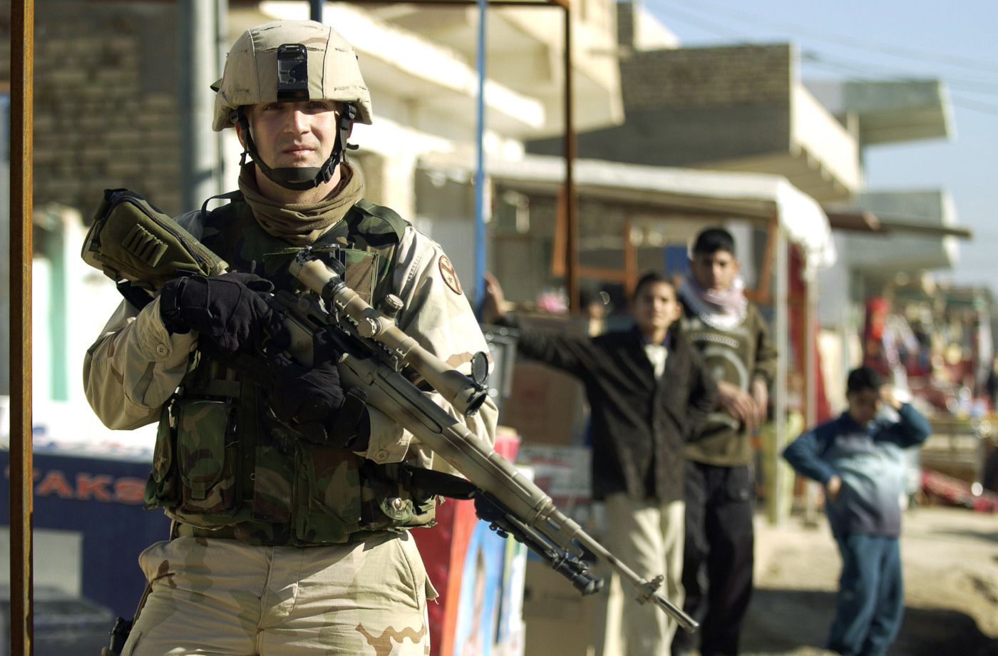 US Army sergeant on patrol with M21 rifle