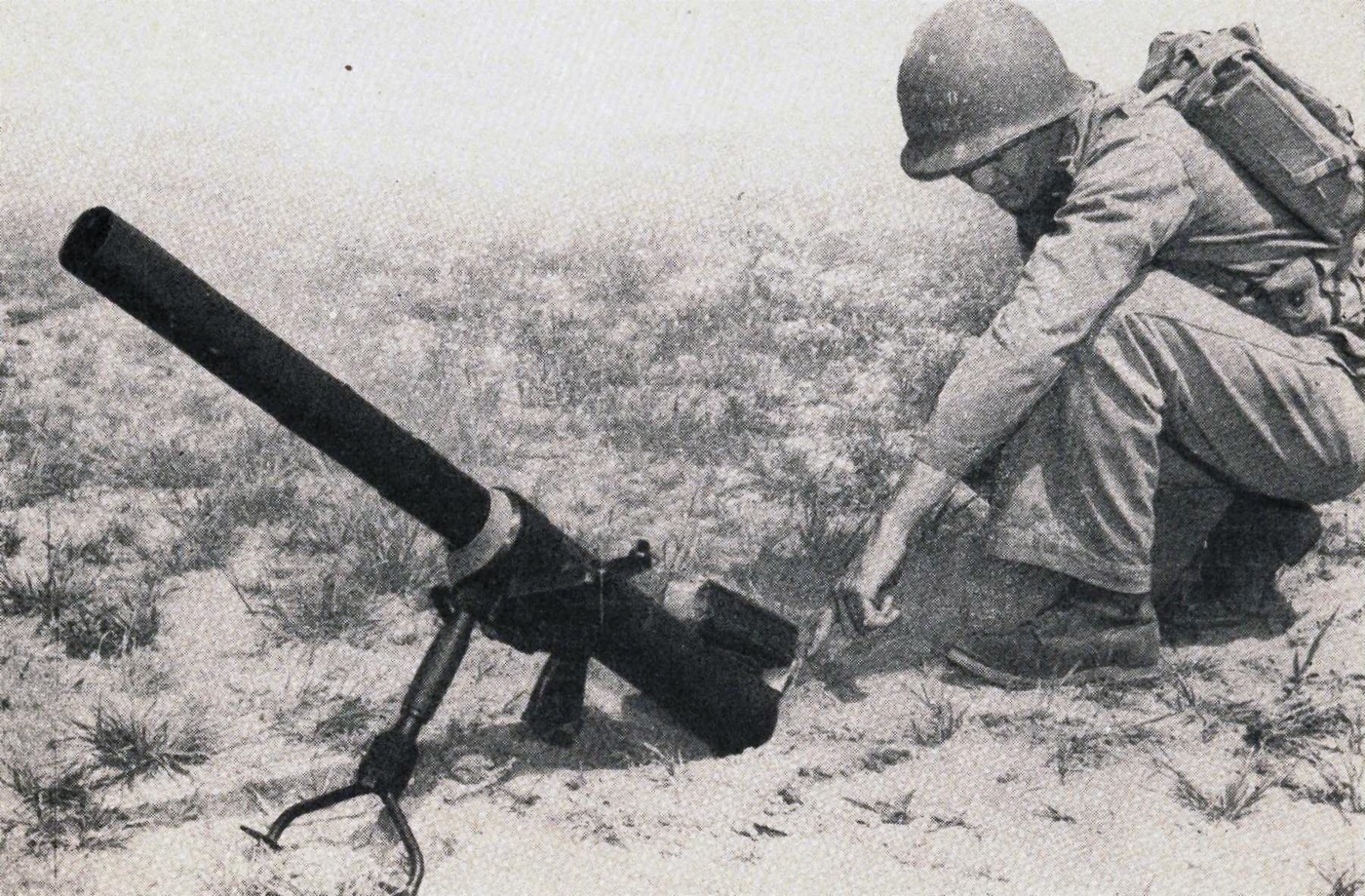 US Marine working with Garrett 60mm shoulder fired mortar
