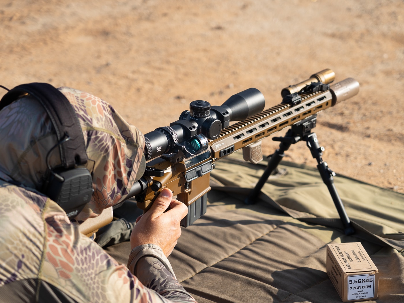 author shooting SAINT rifle with Silent Steel Micro Streamer at the shooting range