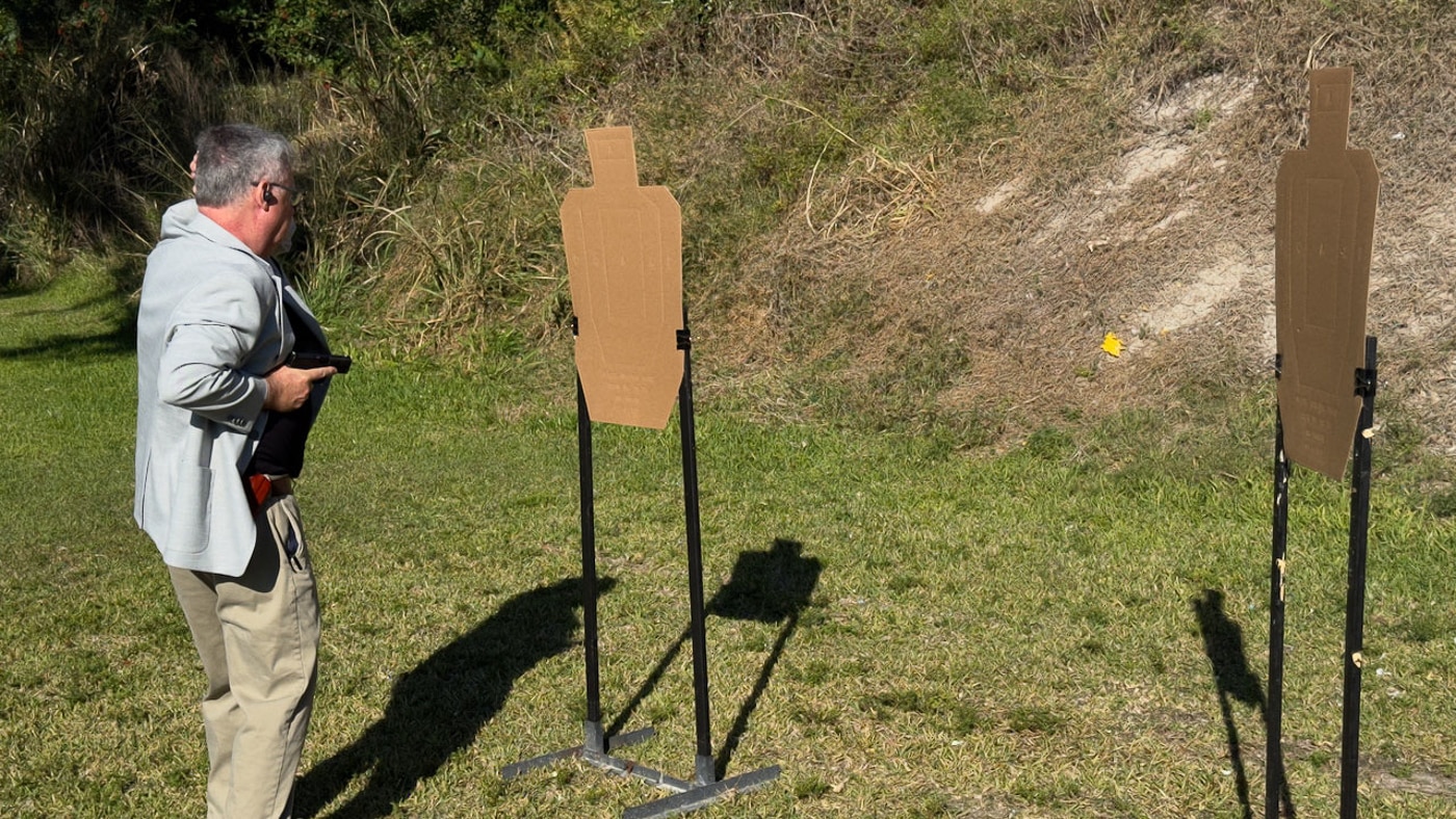 author shooting from a retention position