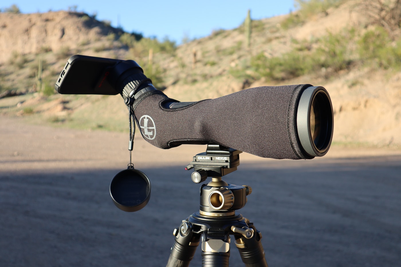 close up of phone attached to Leupold spotting scope using Ollin products