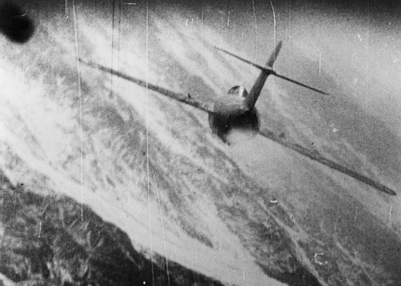 gun camera shows a MiG-15 being attacked by a USAF fighter jet during the Korean War