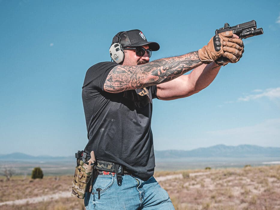 A shooter practices pistol drills at an indoor or outdoor shooting range with targets visible downrange. Rapid shooting requires consistent trigger management. Quick pistol shots demand proper grip fundamentals. Defensive handgun training improves reaction speed. Combat shooting exercises build muscle memory. Action shooting competitions test marksmanship velocity. Police qualification courses measure draw stroke efficiency. CCW permit holders need practical proficiency. Multiple shot placement determines self-defense success.