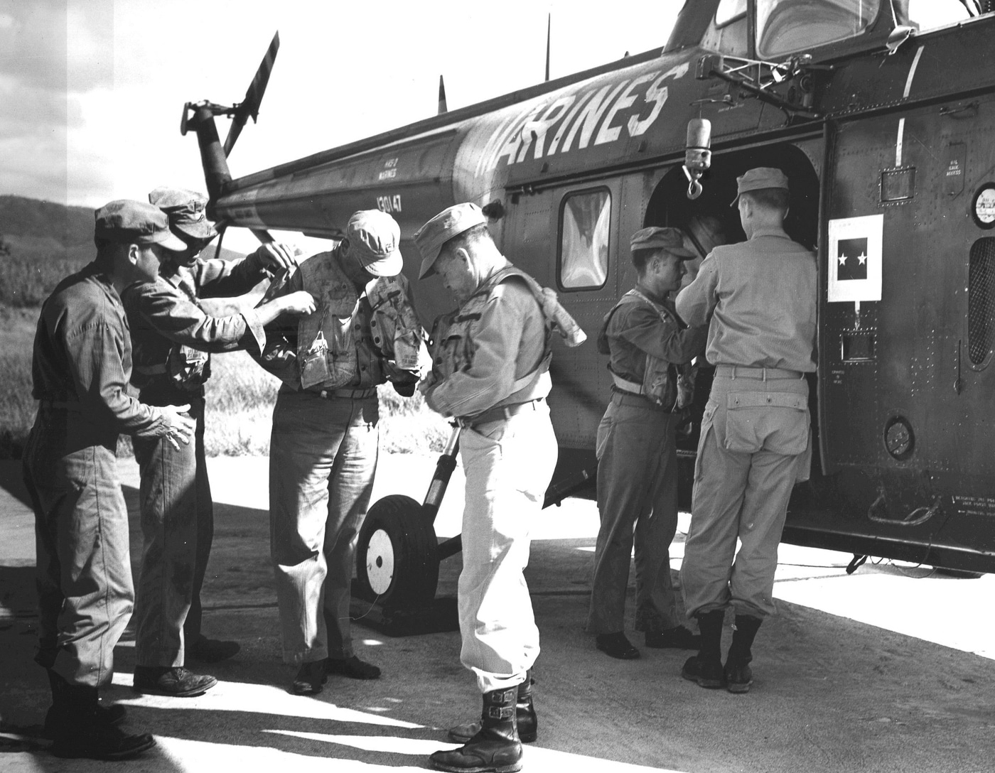 Maj Gen Puller dons a life preserver for a helicopter flight over Roosevelt Roads Puerto Rico