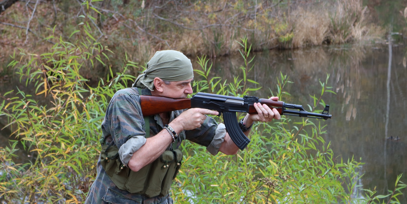 author aiming his AK-47 rifle