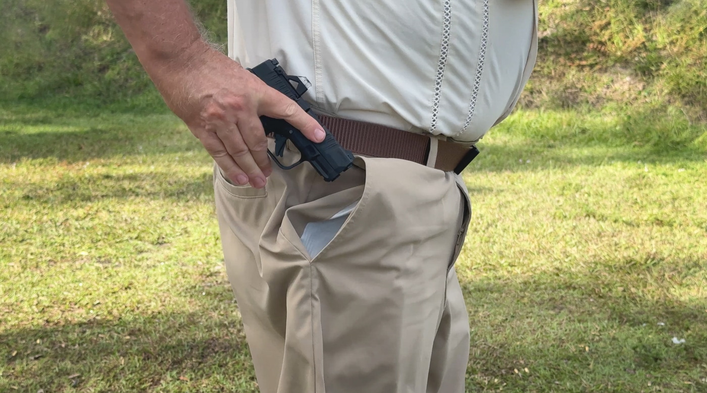 author draws Hellcat 380 from his pocket