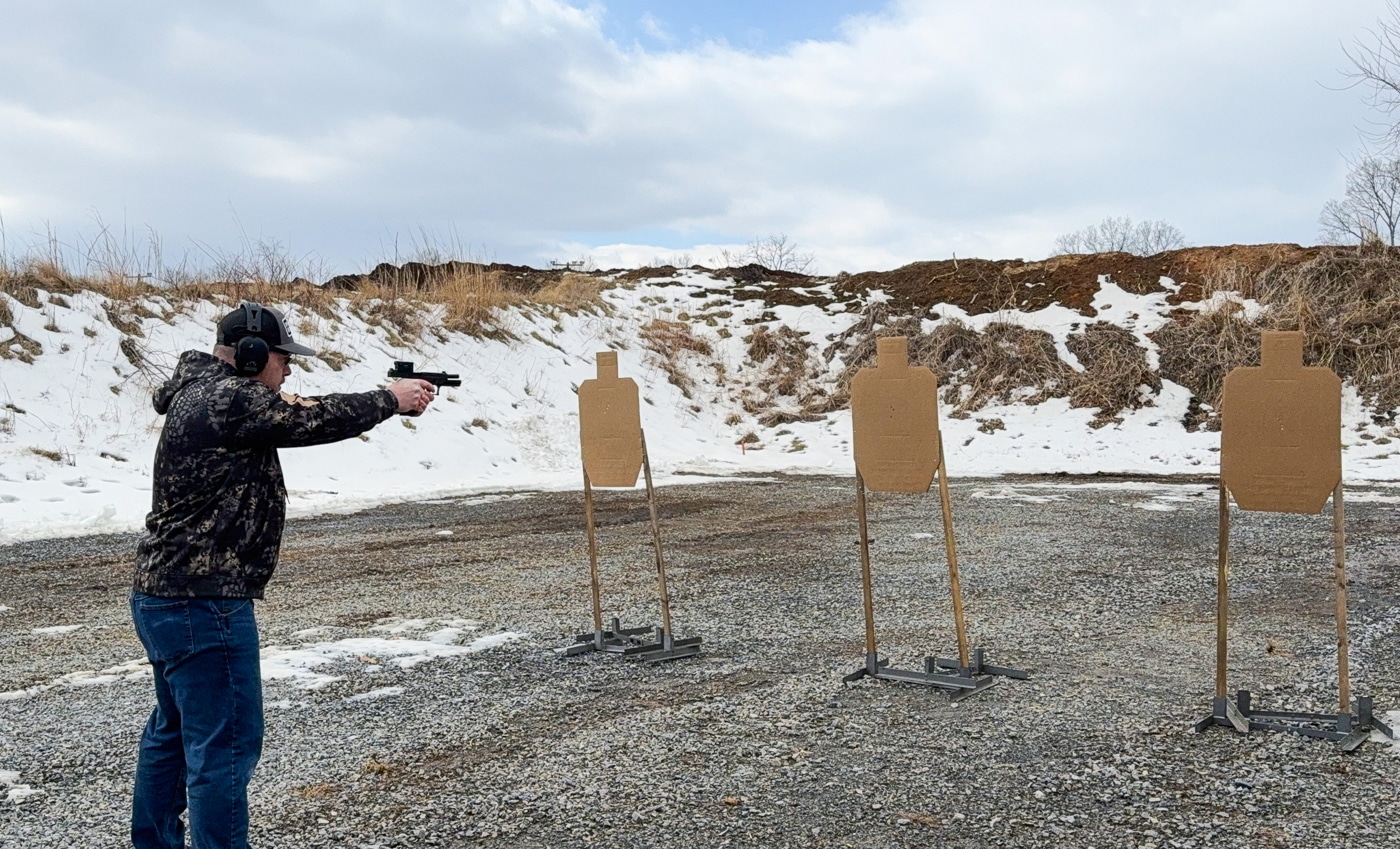 author engaging targets on the shooting range with the PB-3 red dot
