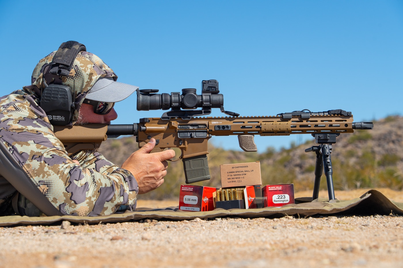 author testing the Vortex scope on the shooting range from a prone position