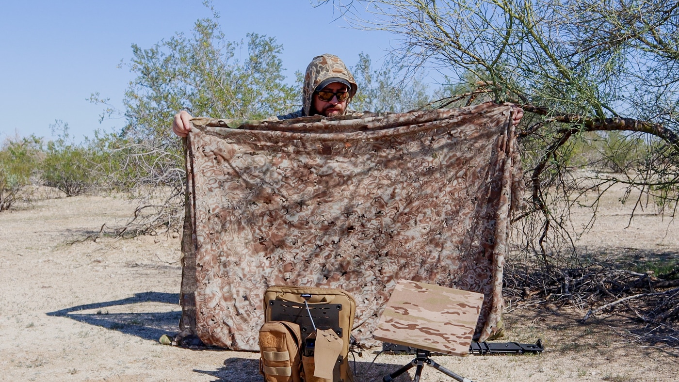 author using camo netting on Starlink Mini