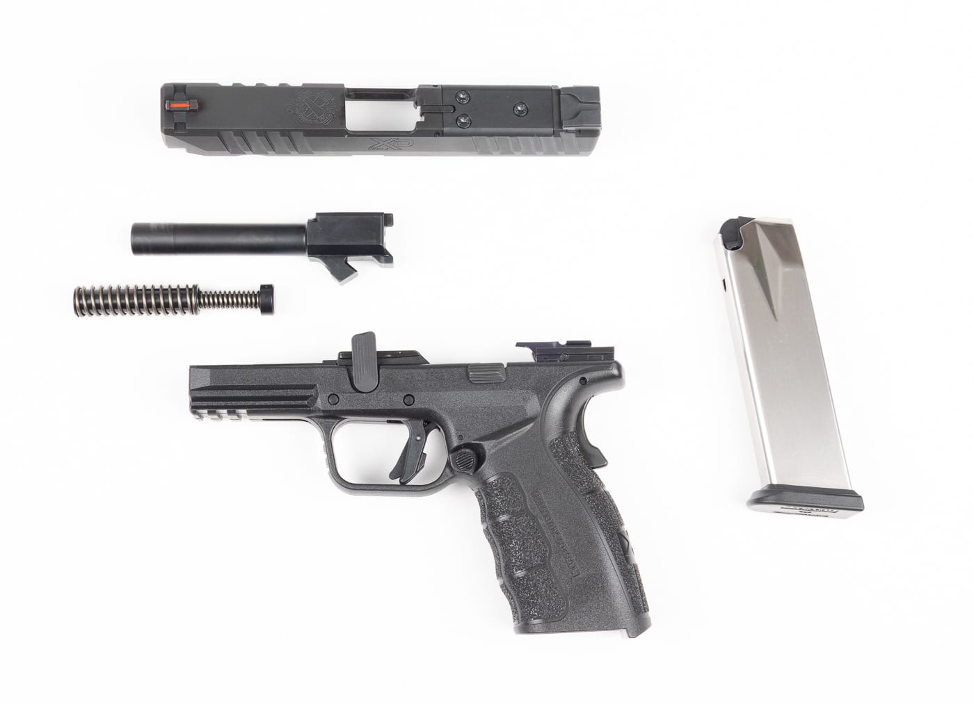 frame and parts of field stripped Springfield Armory XD Mod.4 pistol