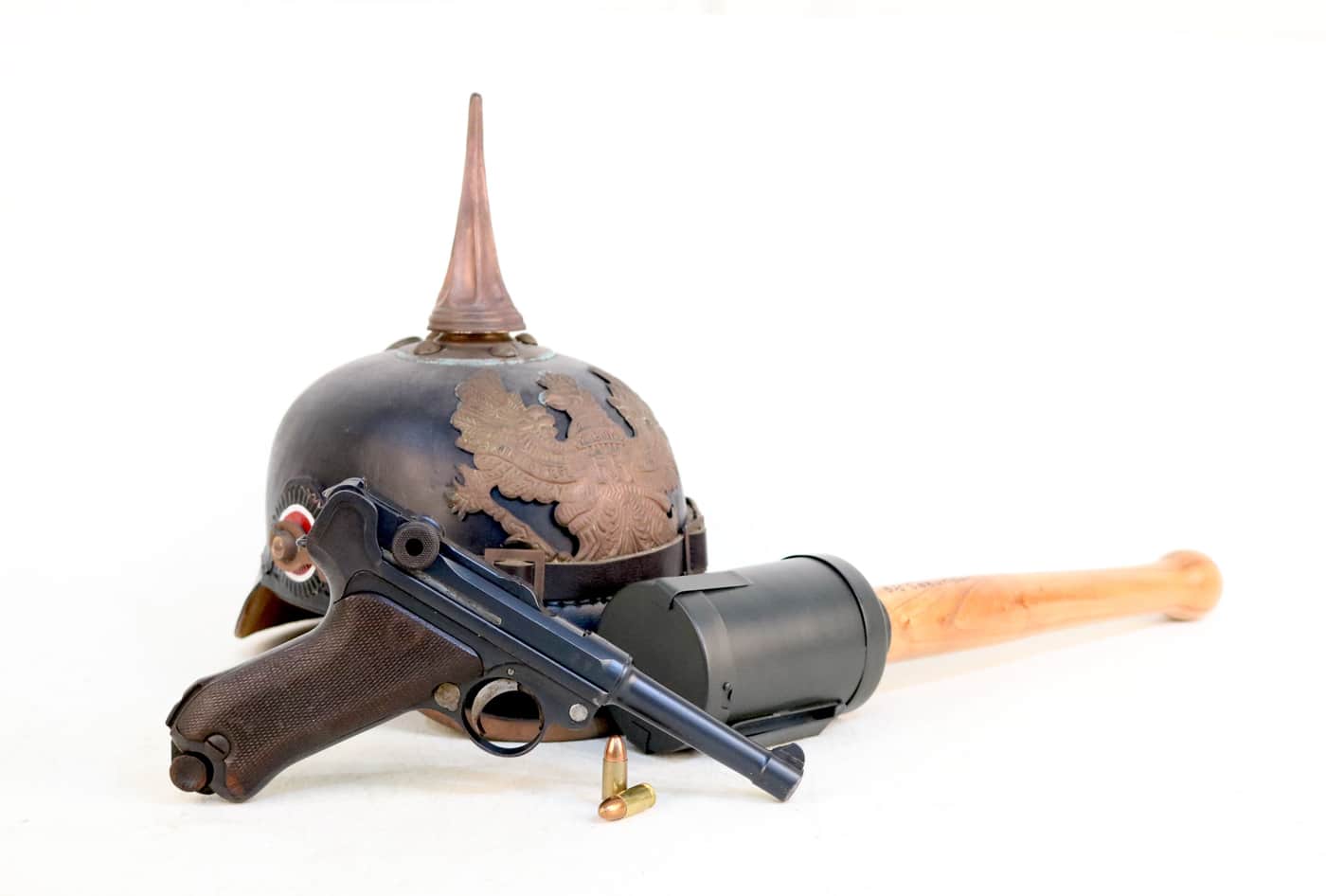 standard 4-inch Luger with Pickelhaube and Stielhandgranate