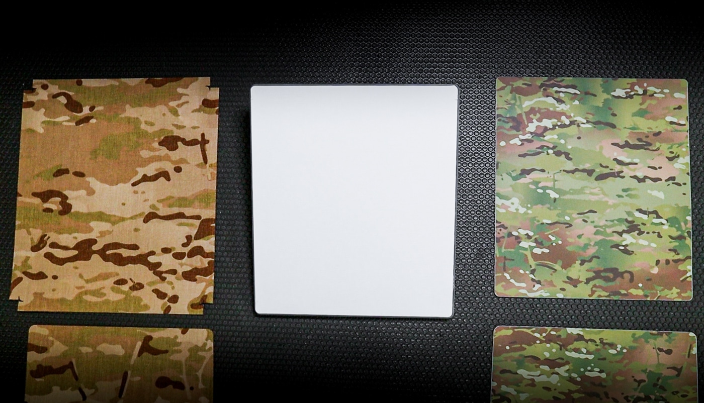 white panel with camo coverings