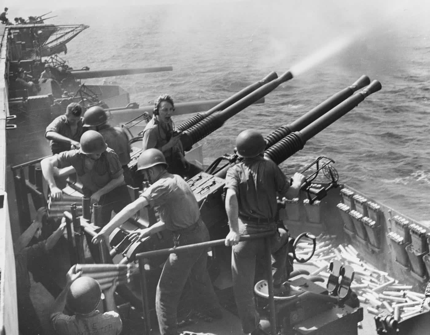 40mm Bofors guns fire on USS Hornet CV-12 during World War II