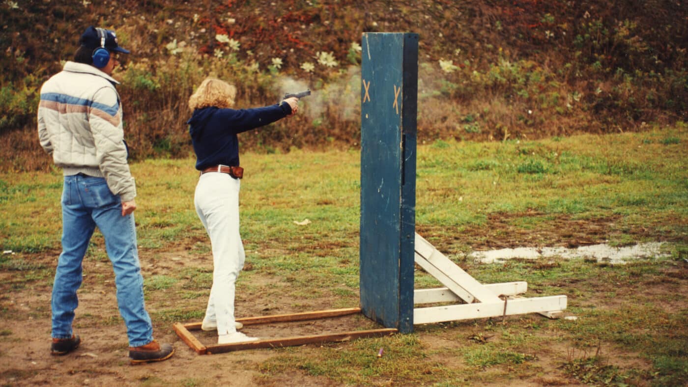 Julie Golob runs a P35 pistol during competition