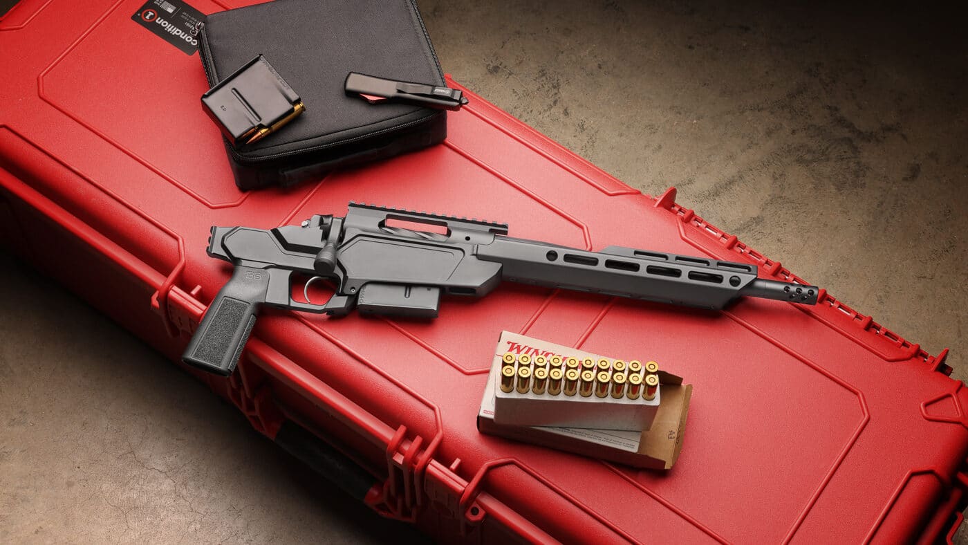 Springfield Model 2020 Heatseeker pistol with ammo at the range