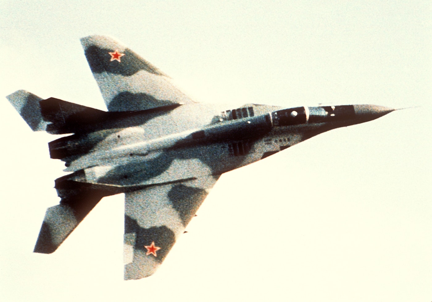 air-to-air top left view of a Soviet MiG-29 Fulcrum aircraft