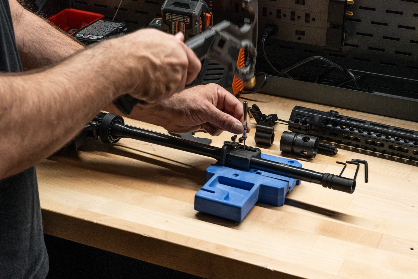 author drifting out pin on gas block while installing Midwest Industries Combat Rail HD on Springfield Armory AR-15