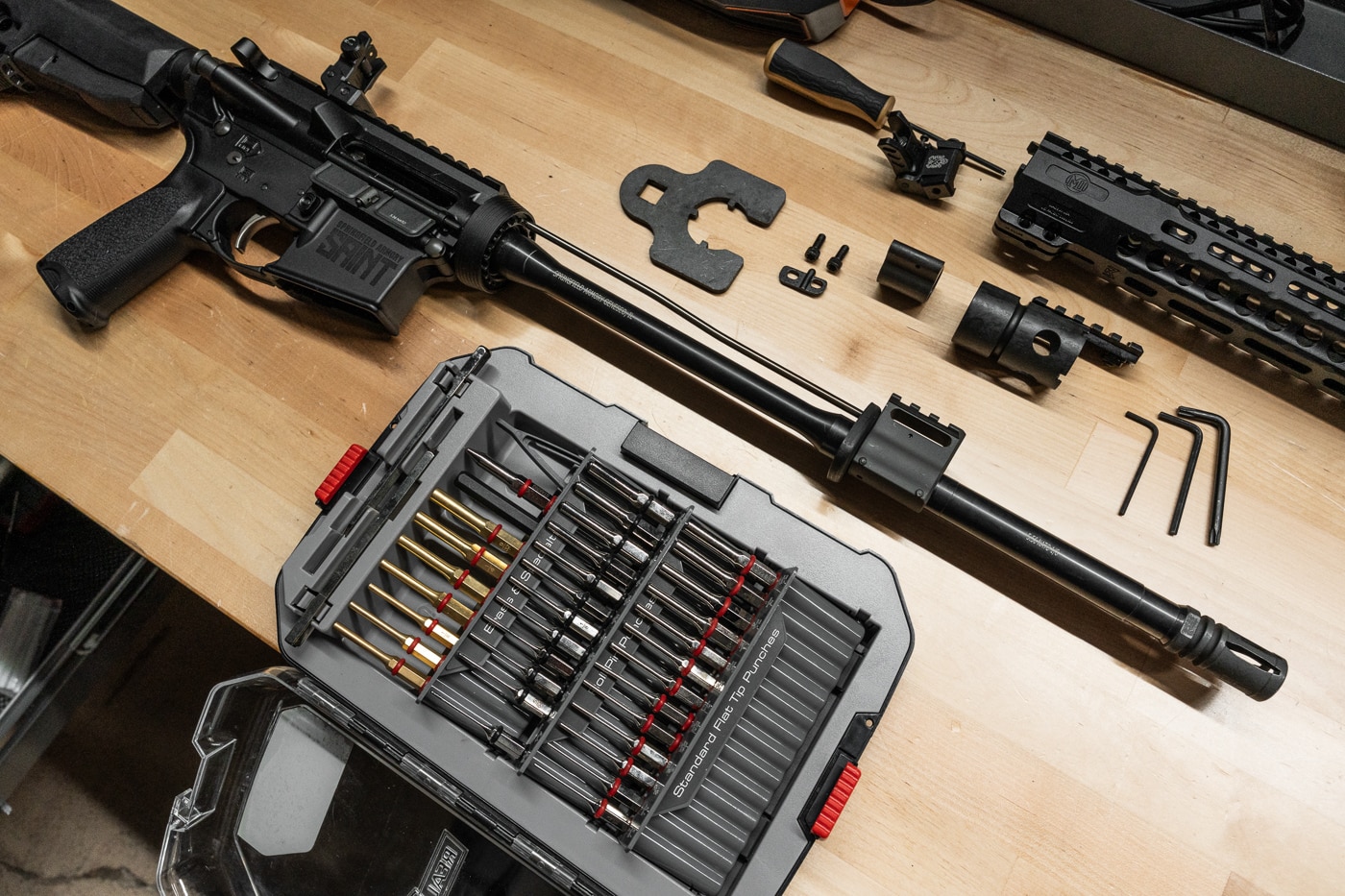 author installing Midwest Industries Combat Rail HD on Springfield Armory AR-15