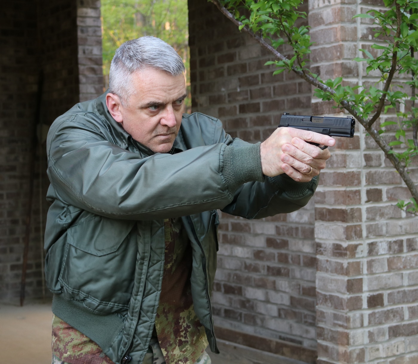 author with Springfield Hellcat pistol