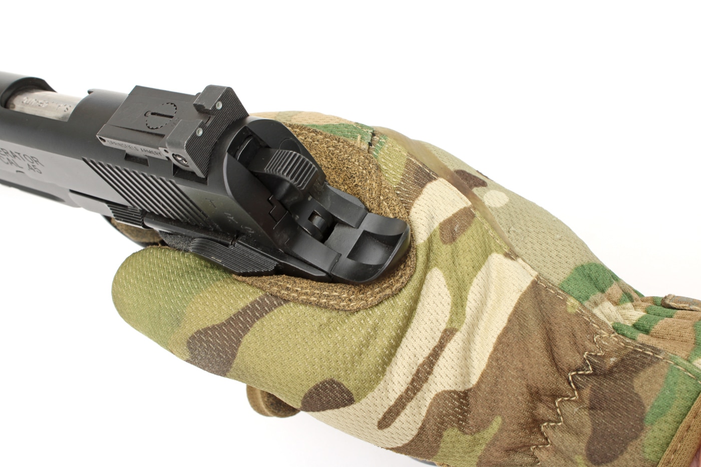 gripping the grip safety on a 1911 pistol