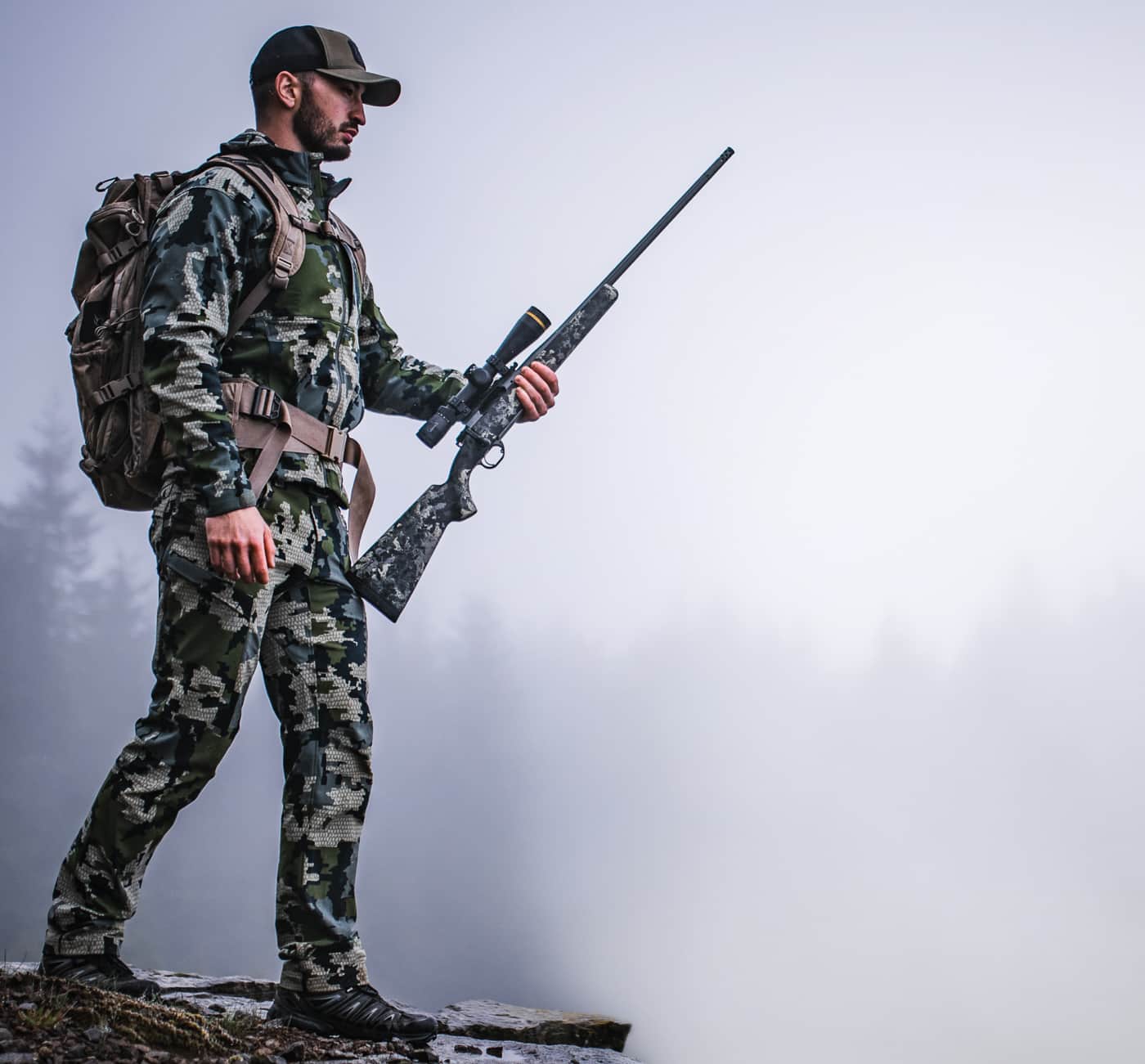 man carrying Springfield Armory Model 2020 Boundary rifle