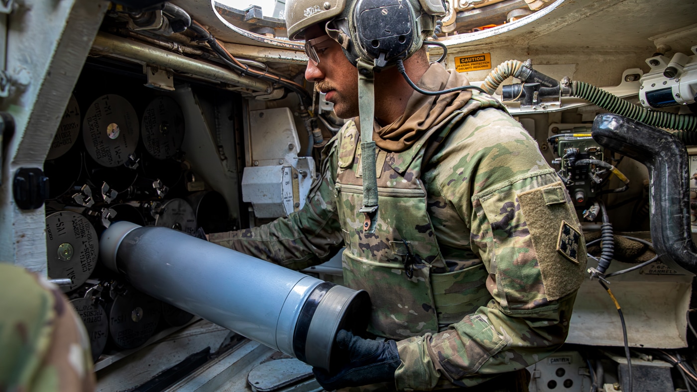 M1A1 Abrams tank gunner loads ammunition during training at Fort Carson Colorado