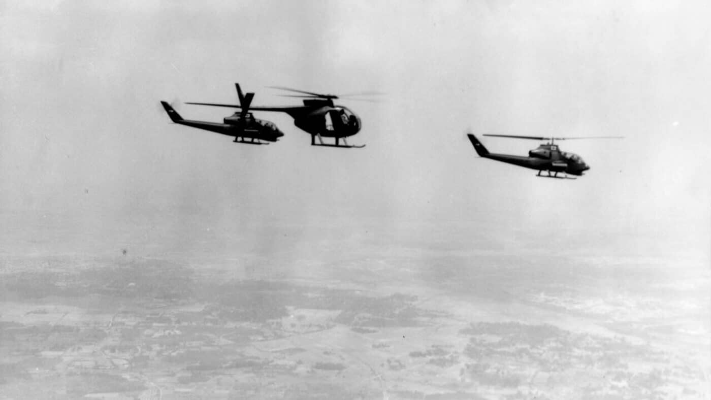 OH-6A and two AH-1G Cobra helicopters flying a reconnaissance mission near Phuoc Vinh in 1970
