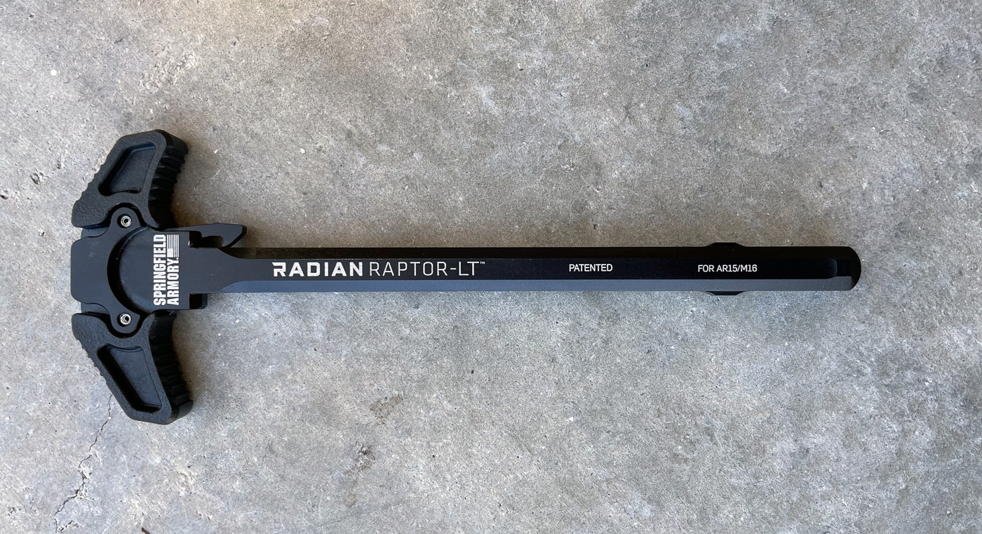 A detailed product view of the Radian Raptor-LT charging handle reveals the textured serrations along the front and rear of each paddle, designed for positive grip during fast manipulation. The Radian Raptor-LT review focuses on tactile features. Serrations grip gloved hands. Shooters demand reliable traction. Charging handles need texture. AR-15 operators wear gloves. Cold weather requires grip. Tactical use demands serrations. Smooth handles cause slippage.