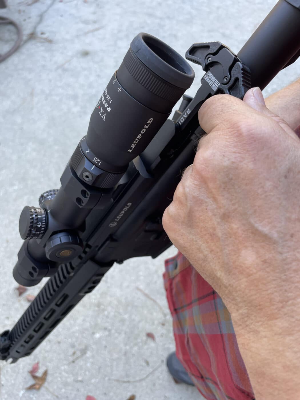 Raptor LT handle easier than mil-spec with a scope mounted on your AR-15 rifle