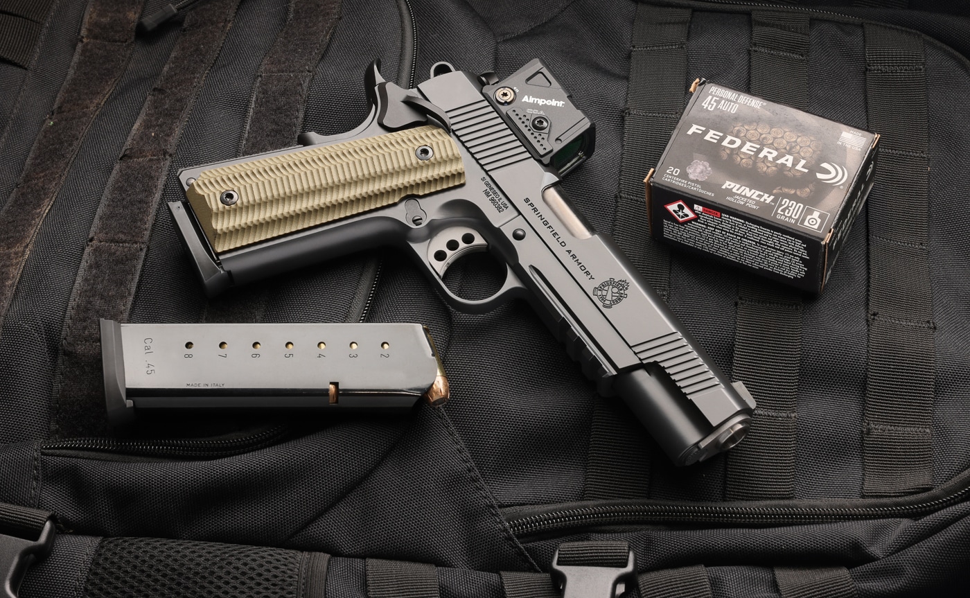 Springfield 1911 Operator with Aimpoint COA red dot sight