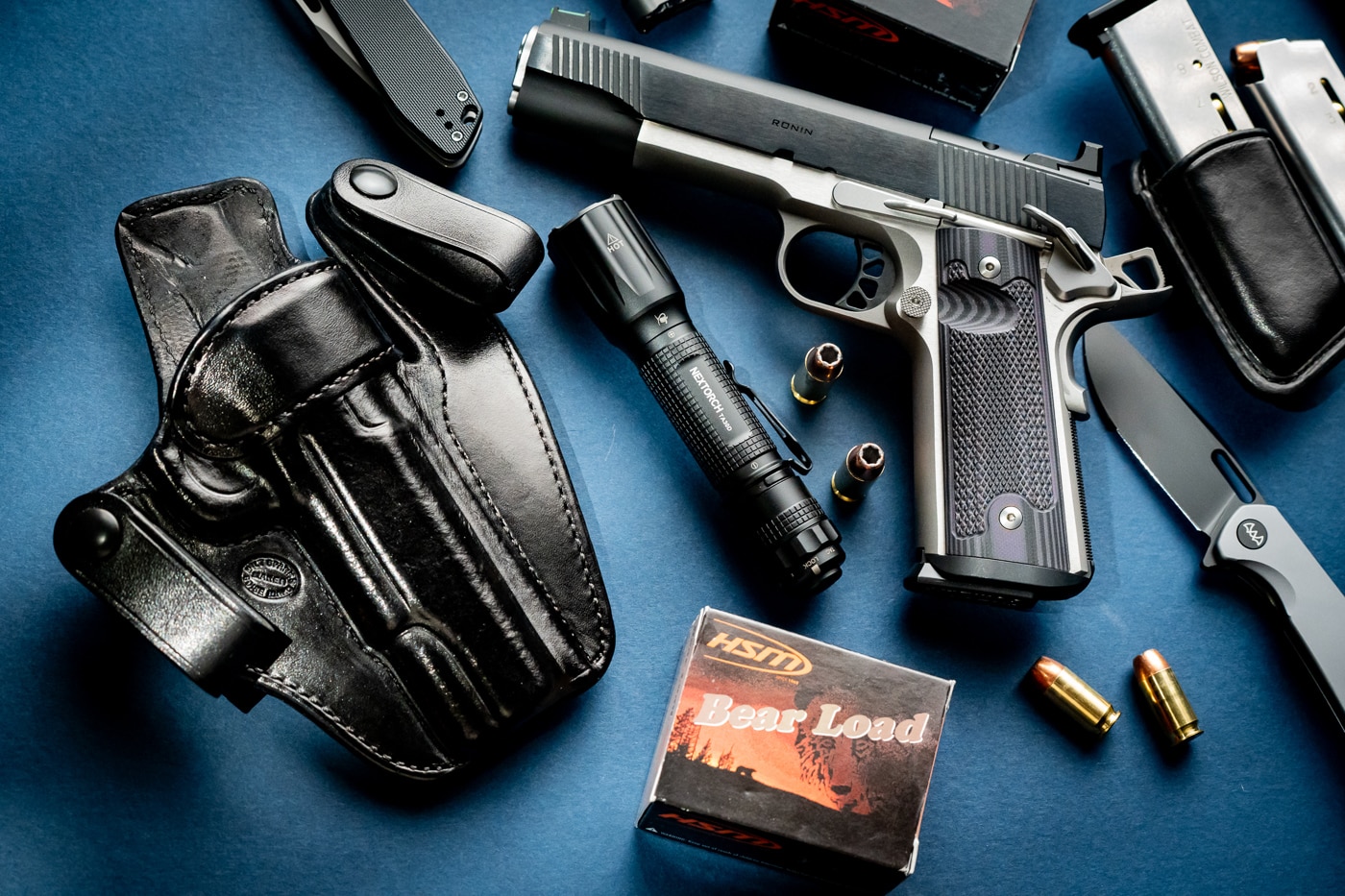 Springfield 1911 Ronin with leather IWB holster and ammunition