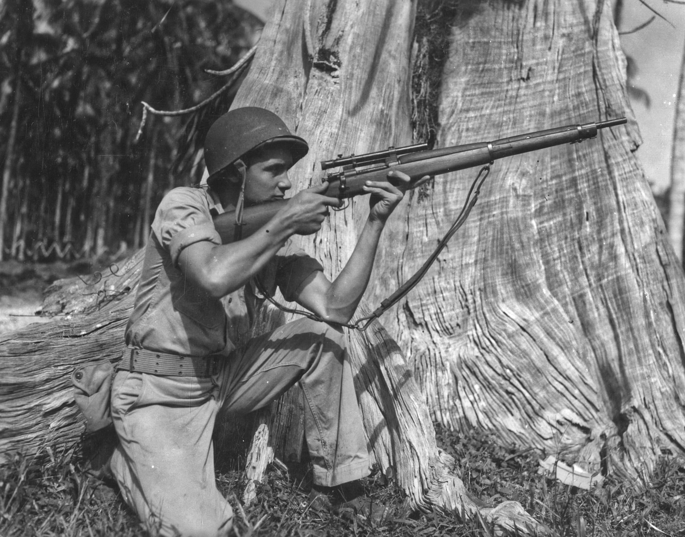 US Marine shoots M1903A4 sniper rifle during New Britain Campaign