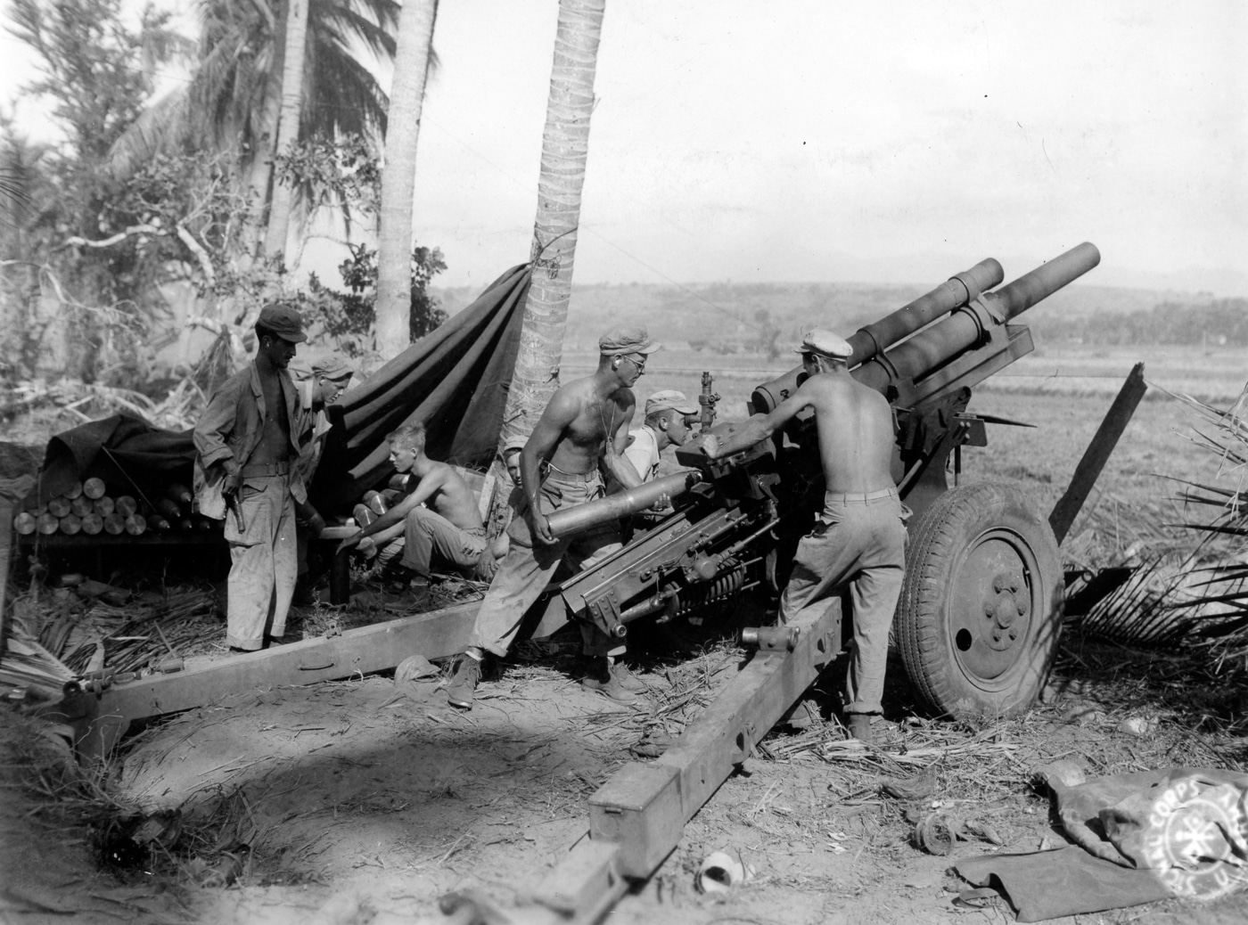 US artillery battery man 105mm howitzer on Luzon Philippines in World War II
