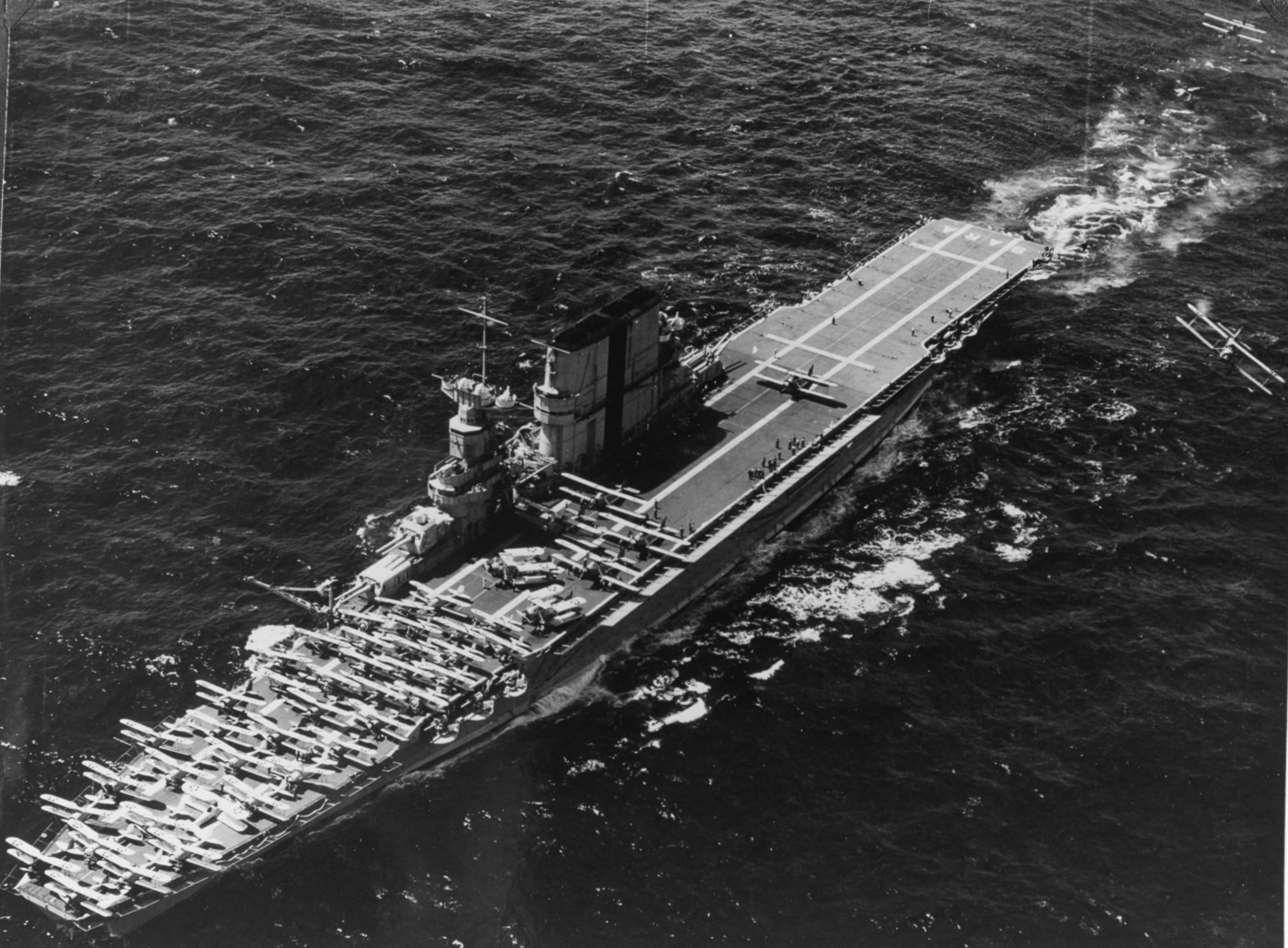 USS Saratoga recovers Martin T4M bombers during flight operations in the 1930s