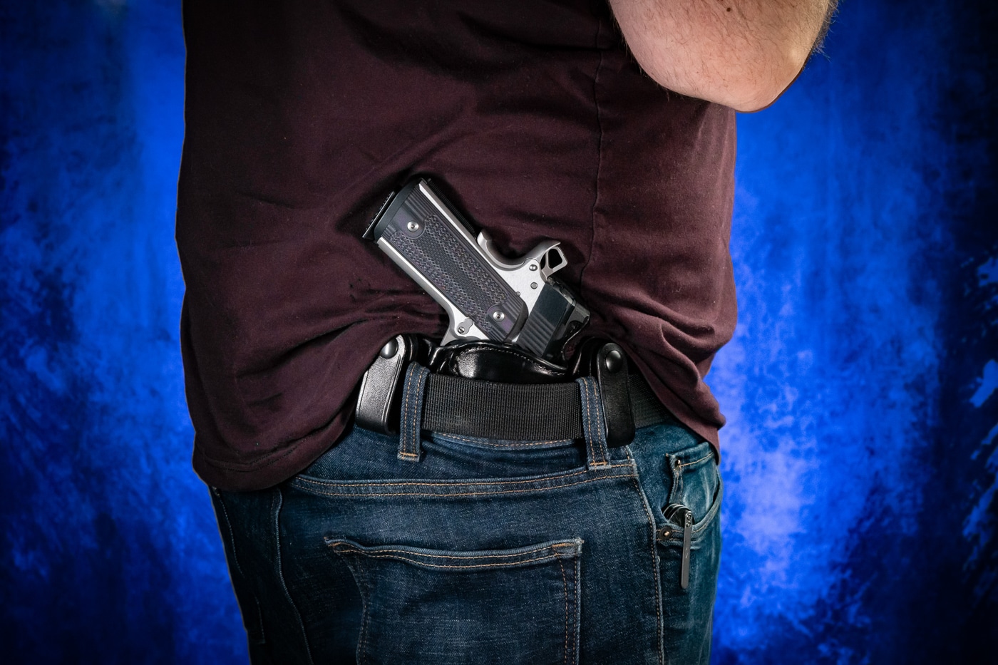 author carrying the Springfield 1911 Ronin in an IWB holster