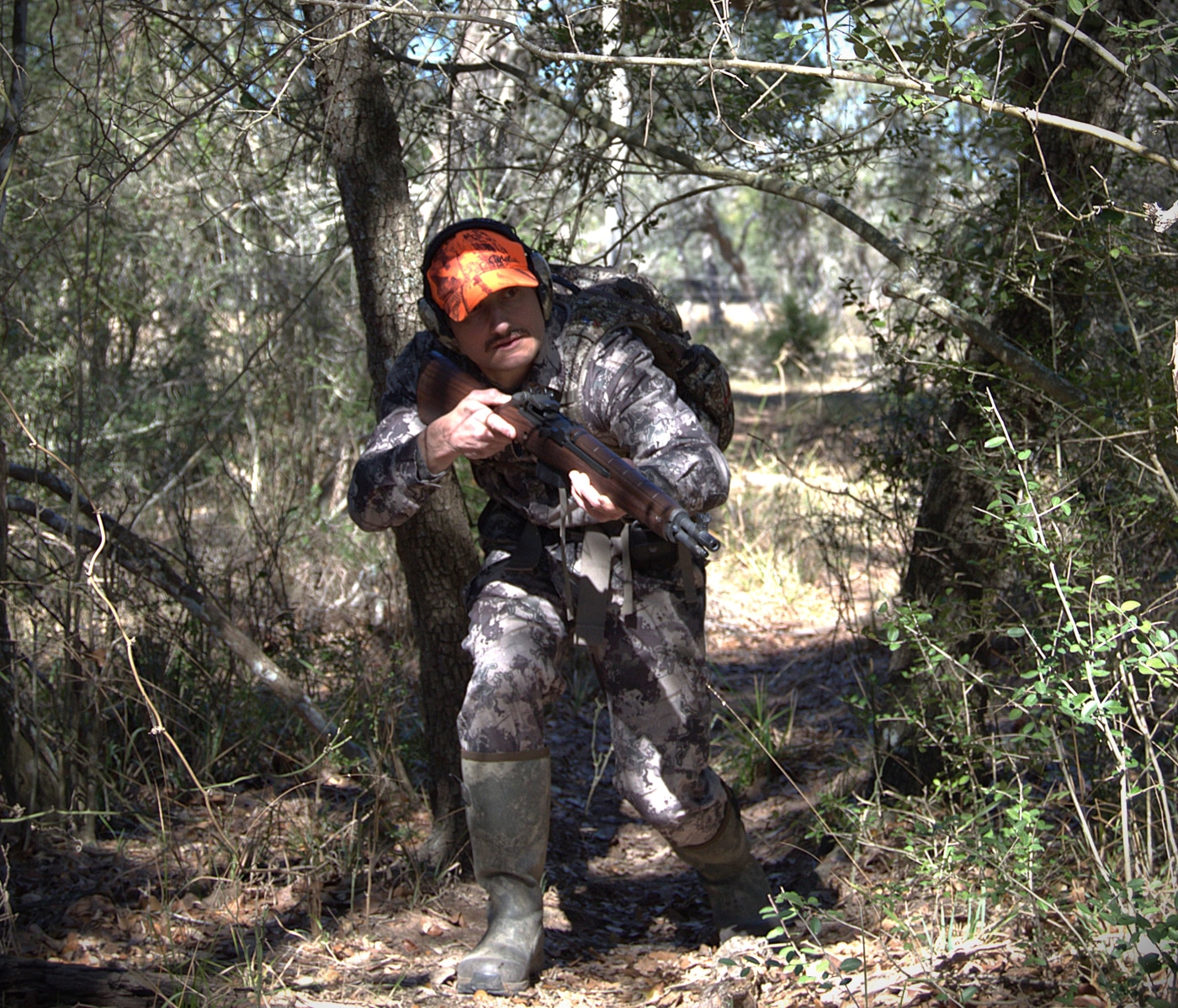 author testing the best brush gun in the woods