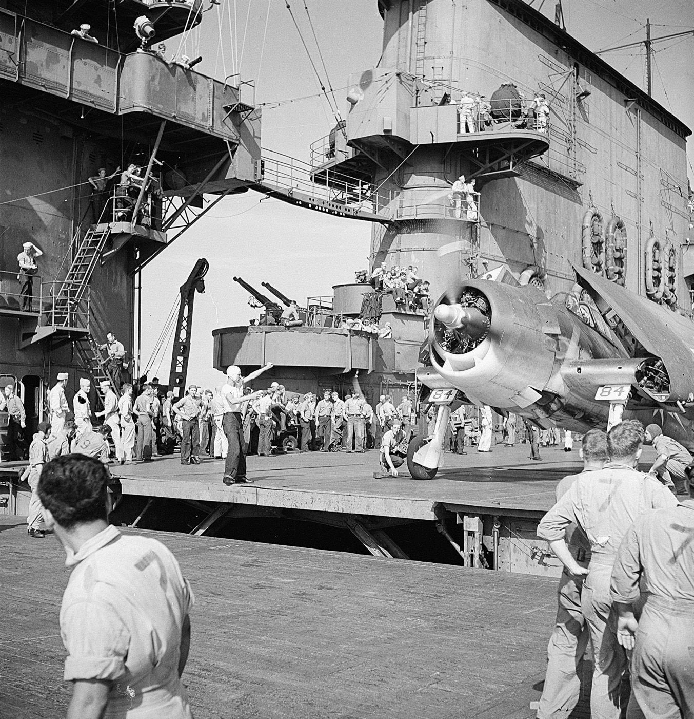 crewmen conducting air operations on USS Saratoga