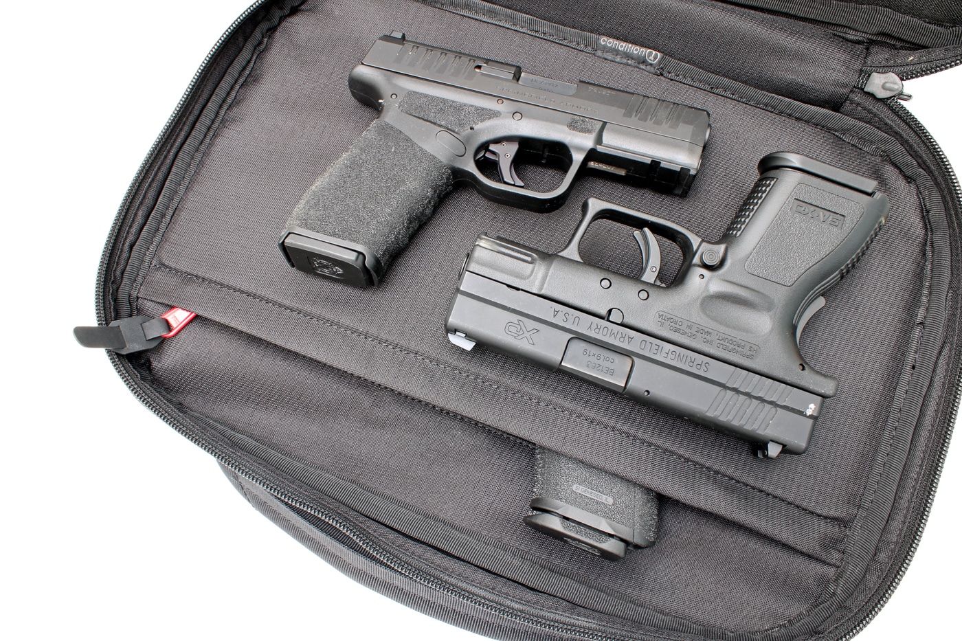 demonstrating size of Kinetic 2 pistol bag showing how many pistols fit inside