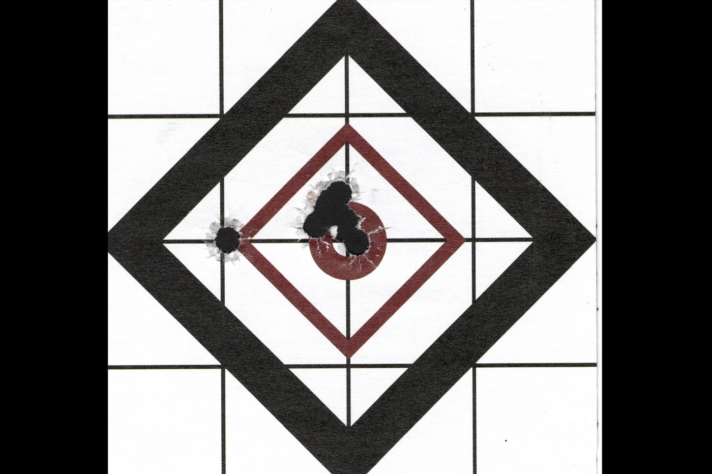 A paper target shows the results of accuracy testing with Fiocchi CovertX 9mm ammunition, displaying four separate five-round groups fired at 15 yards. The Fiocchi CovertX 9mm review used a Ransom International Multi-Cal Steady Rest to provide a stable shooting platform while still allowing natural firearm control. Group sizes measured 0.975", 1.30", 0.95", and 1.065", producing an average of 1.073". The best group came in at 0.95", with one obvious flyer in an otherwise tight cluster. Defensive ammunition does not need match-grade accuracy, but consistent groups under 1.5" at 15 yards are excellent for a short-barreled carry pistol. The Hellcat Pro and CovertX 124-gr. JHP clearly worked well together. Accuracy this good means the shooter, not the gear, is the limiting factor in a defensive situation.