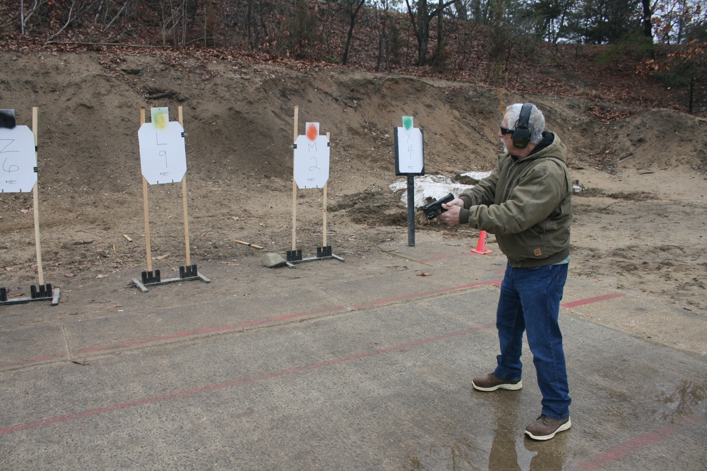 A shooter moves laterally along a firing line with a handgun in a low ready position while passing a row of numbered and lettered silhouette targets. Dynamic drills like this one introduce decision-making into a training session in a way that static shooting never can. The partner or instructor calls out a designator, and the armed citizen must identify the correct target before engaging. Processing audible cues under time pressure mirrors the cognitive load of a real defensive encounter. Sound tactics, including the use of cover and accurate shot placement, remain just as important as fast identification. Concealed carriers who add this kind of work to their range time develop the mental habits that lead to better decisions under stress.
