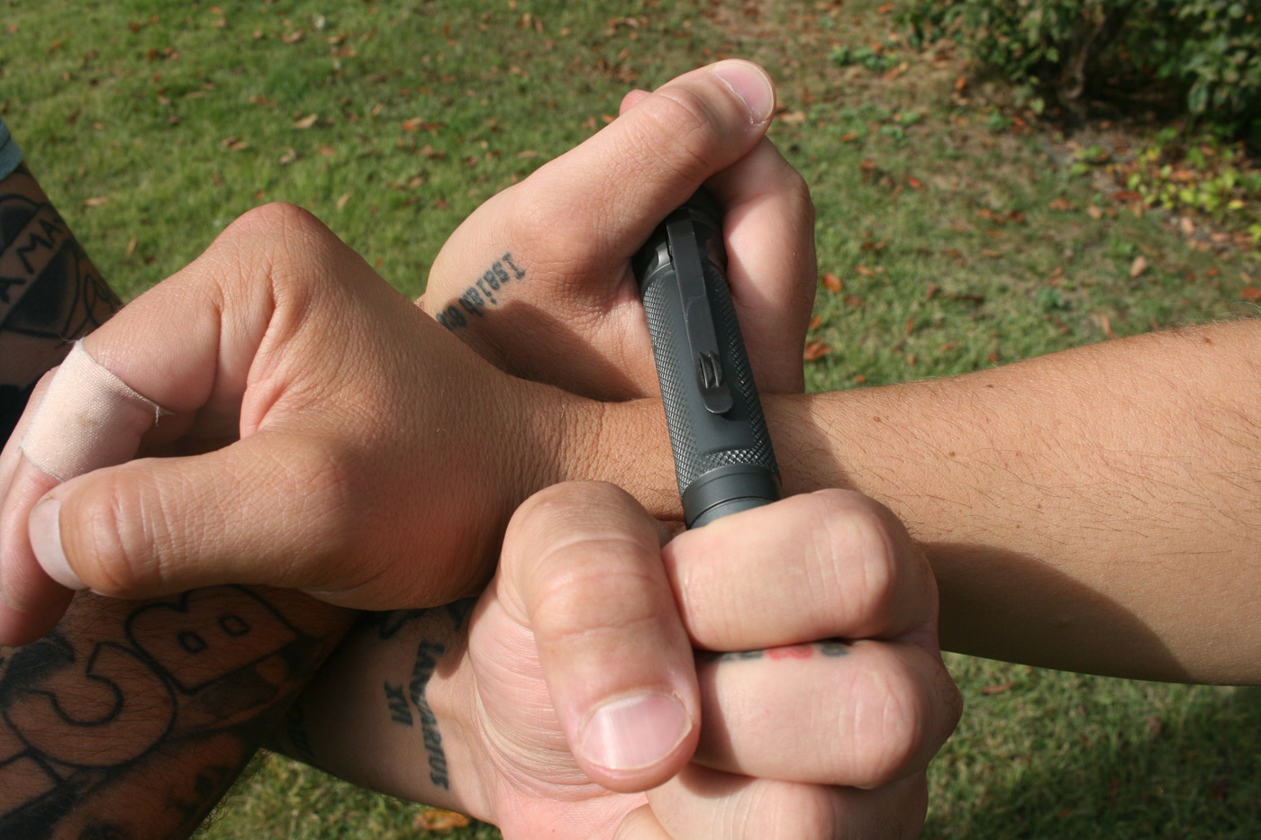 using a flashlight as a pressure point tool