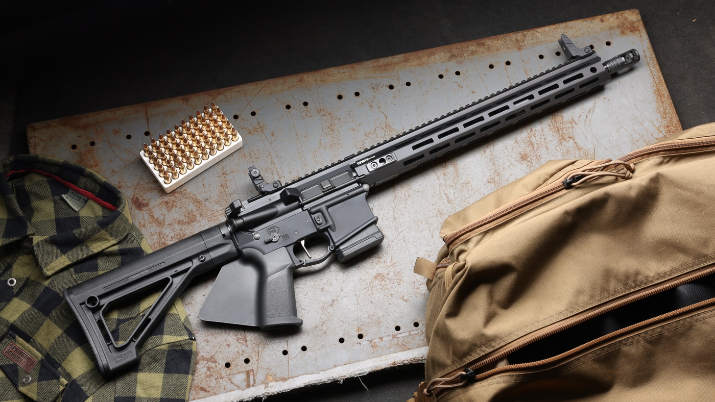 A black Springfield Armory SAINT Victor AR-10 rifle is shown in profile against a plain background, fitted with a featureless grip and a fixed rear stock. This is the California-compliant version of the SAINT Victor chambered in .308 Winchester, also known as 7.62x51mm NATO. The featureless build swaps the standard pistol grip for the "fin" so the semi-auto rifle stays legal in the state while keeping a detachable magazine. Like the rest of the CA-compliant SAINT Victor line, the AR-10 uses forged 7075 T6 receivers and a 9310 steel bolt that passes HPT/MPI inspection. A 16-inch barrel with a 1:10 twist and an effective muzzle brake keep the rifle accurate and manageable despite the larger cartridge. For California shooters wanting more range and energy than the 5.56 AR-15 offers, this AR-10 is the heavier-hitting option in the family.