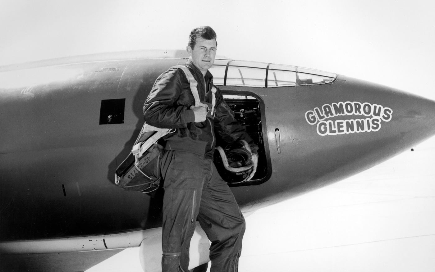 Chuck Yeager stands in front of Bell X-1
