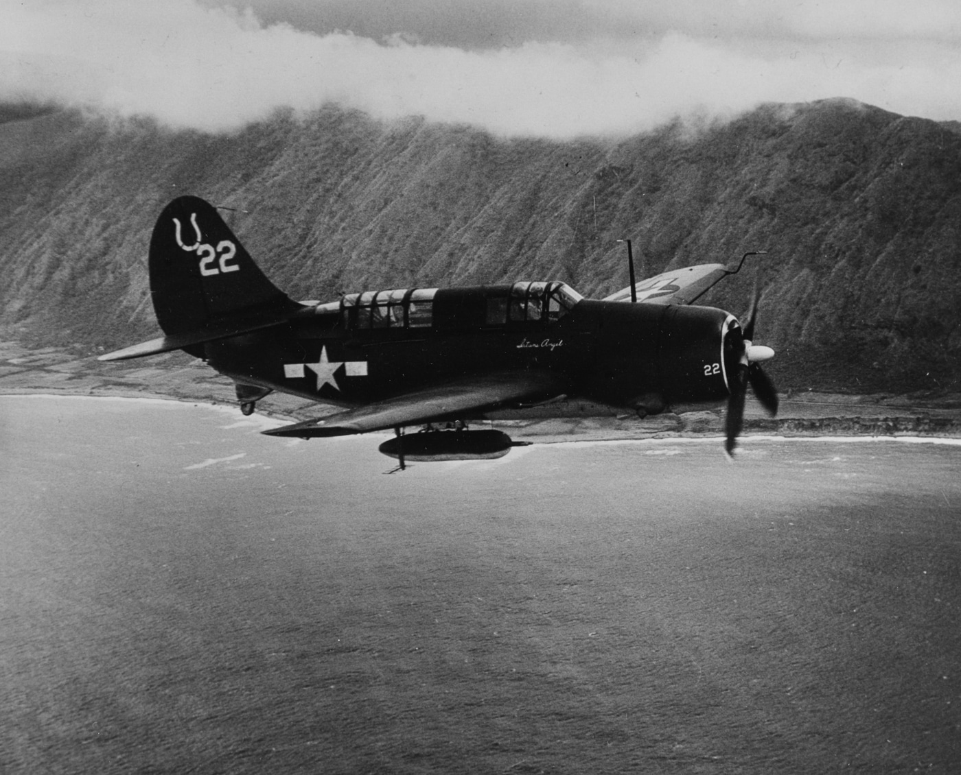 SB2C Helldiver of USS Hancock CV-19 in flight to attack Japanese shipping at Kurin Ko 1944