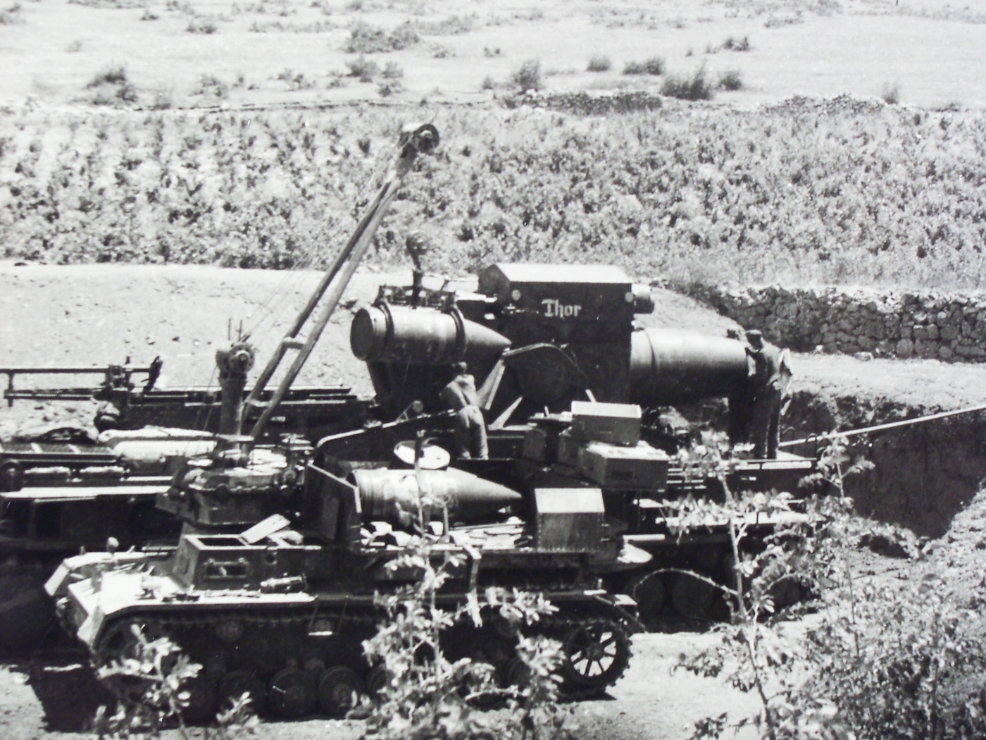 Thor takes on a 2170-pound concrete-piercing shell from its attendant Panzer IV Munitionsschlepper