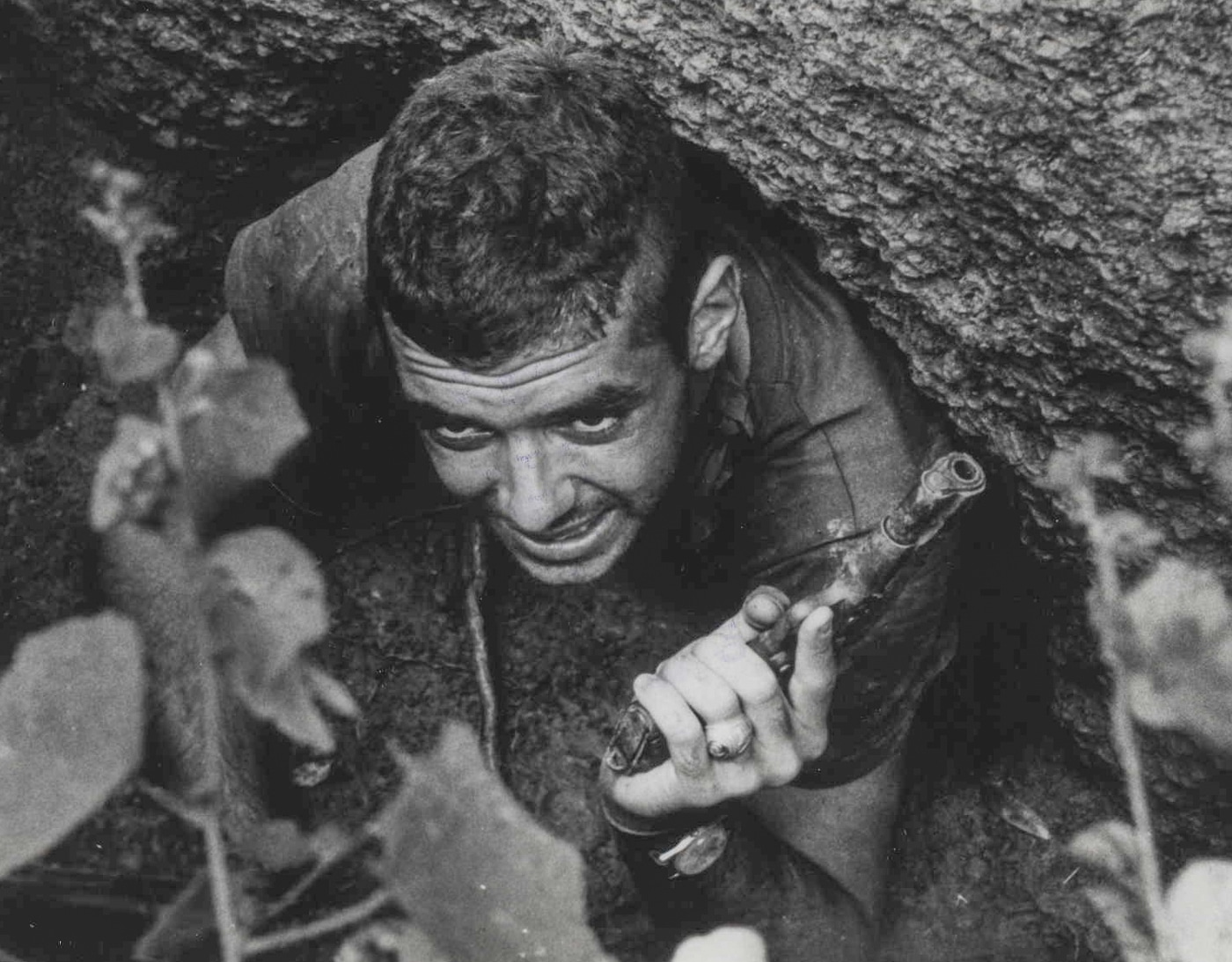 US Marine with M1911 pistol emerges from VC tunnel in Vietnam War
